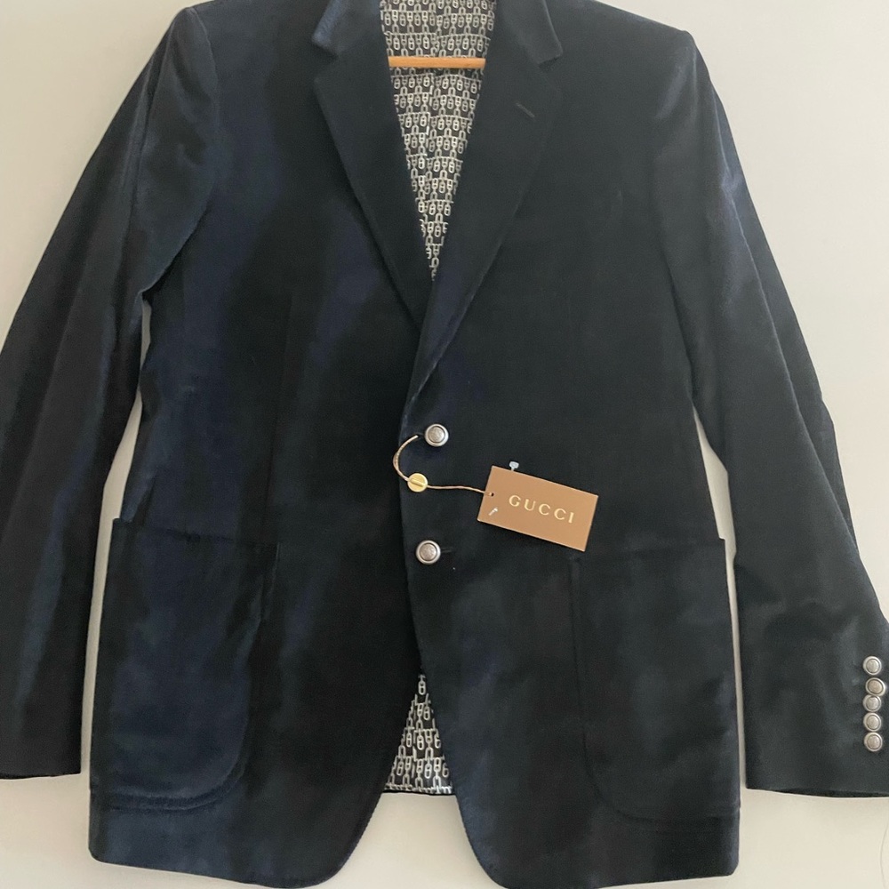 A beautiful never been worn Black Gucci Jacket. It’s just stunning.